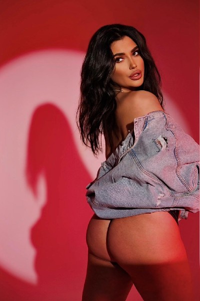 Brianna without underwear from behind and a denim jacket